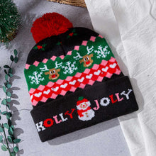 Load image into Gallery viewer, Light Up HOLLY JOLLY Snowman Christmas Pom Pom LED Beanie Hat