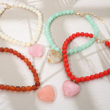 Load image into Gallery viewer, Chunky Marbled Resin Heart Charm Beaded Necklace
